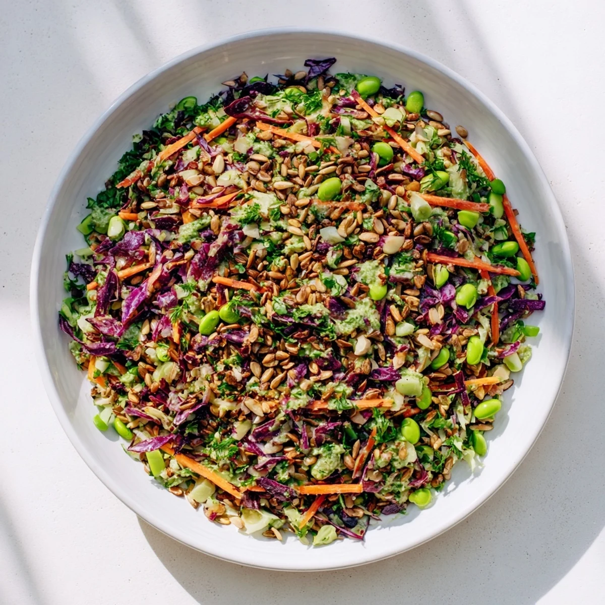 Crisp Crunchy Cabbage and Edamame Salad with vibrant veggies, zesty dressing, and toasted almonds.