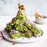 Soft and chewy Matcha Pistachio Christmas Tree Blondie Bars, offering a delightful mix of textures and holiday flavors.