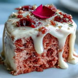 Decadent rosé-infused velvet cake, adorned with a delicate gold drip.