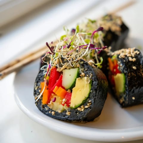 Stacked Nori Rolls with Vegetables highlight creamy avocado and crisp cucumber for dipping.