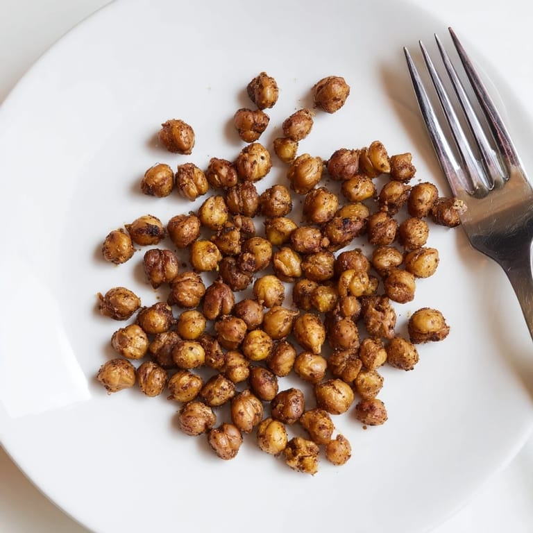 Fresh from the oven, these roasted chickpeas are golden-brown and tossed with aromatic spice blends.