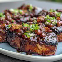 Savory Summer BBQ Baked Beans with Bacon, bubbling in a rich brown sugar and molasses sauce, perfect for backyard cookouts.  